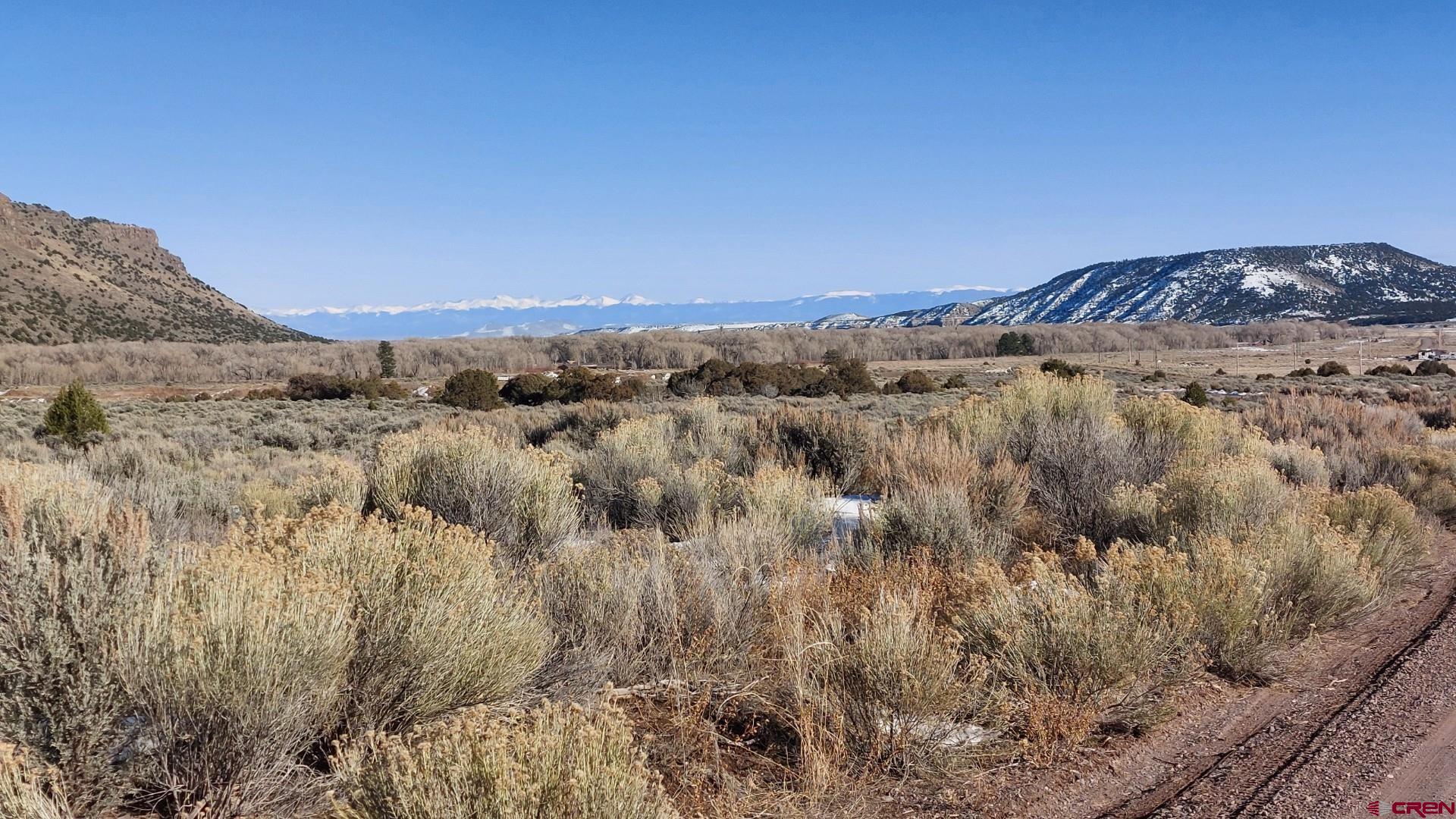 a view of mountains and valleys