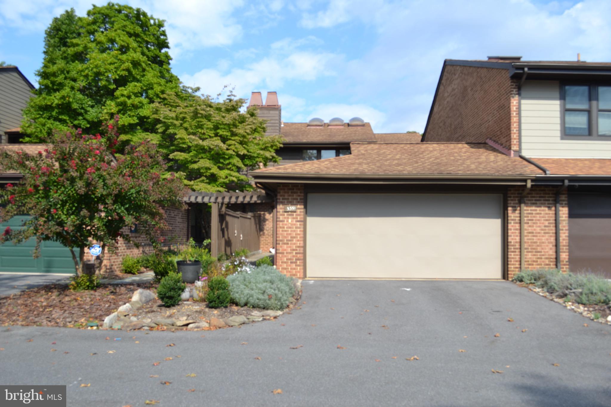 a view of a house with a garage