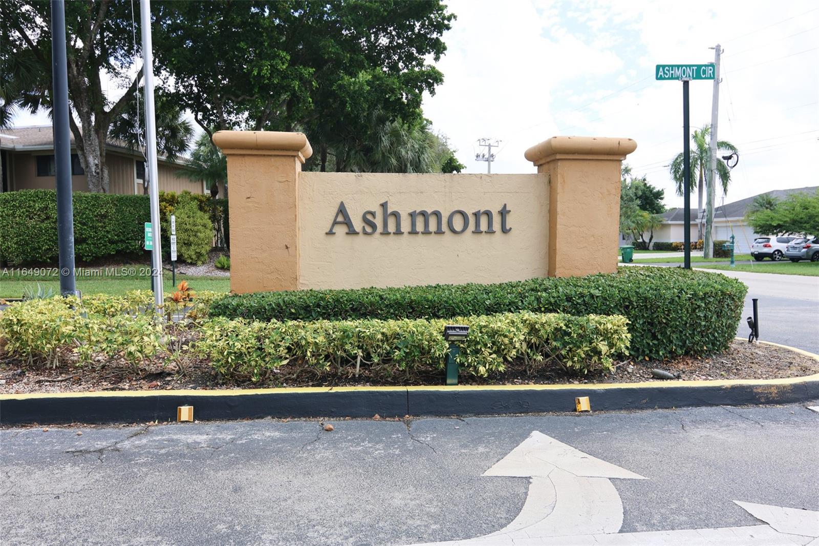 a view of a sign board with a street sign