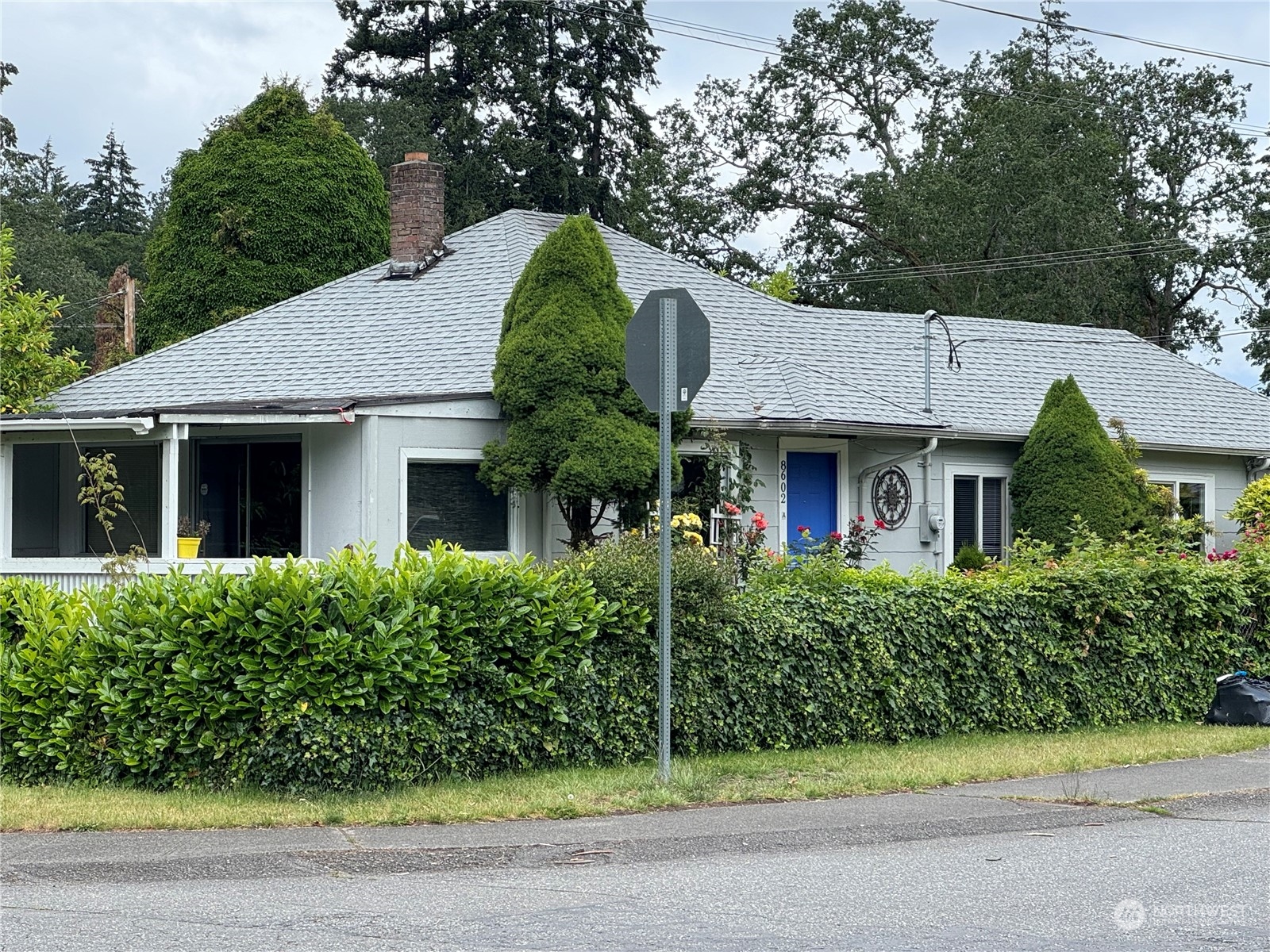 front view of a house with a yard