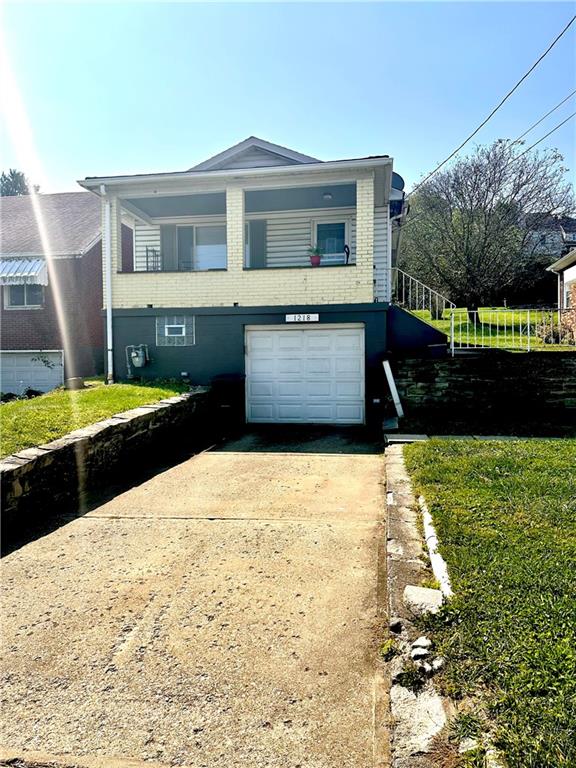 Freshly painted cement where garage is located