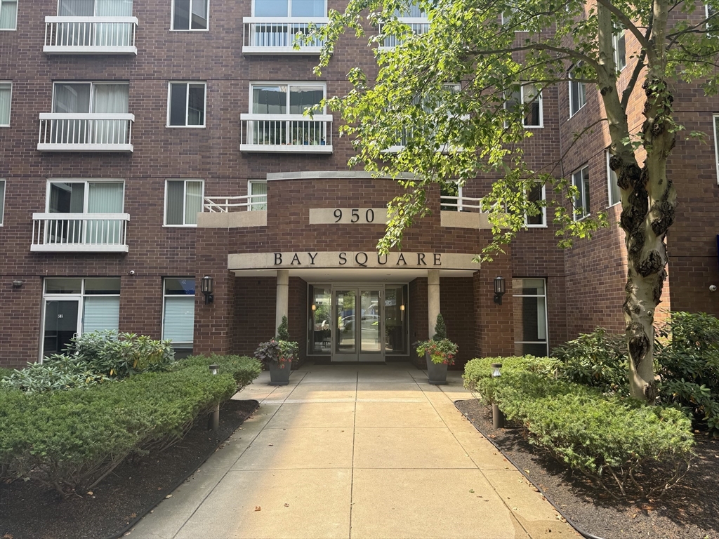 a view of a building with a garden