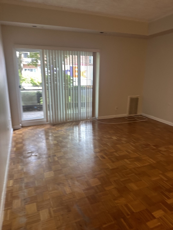 a view of an empty room and window