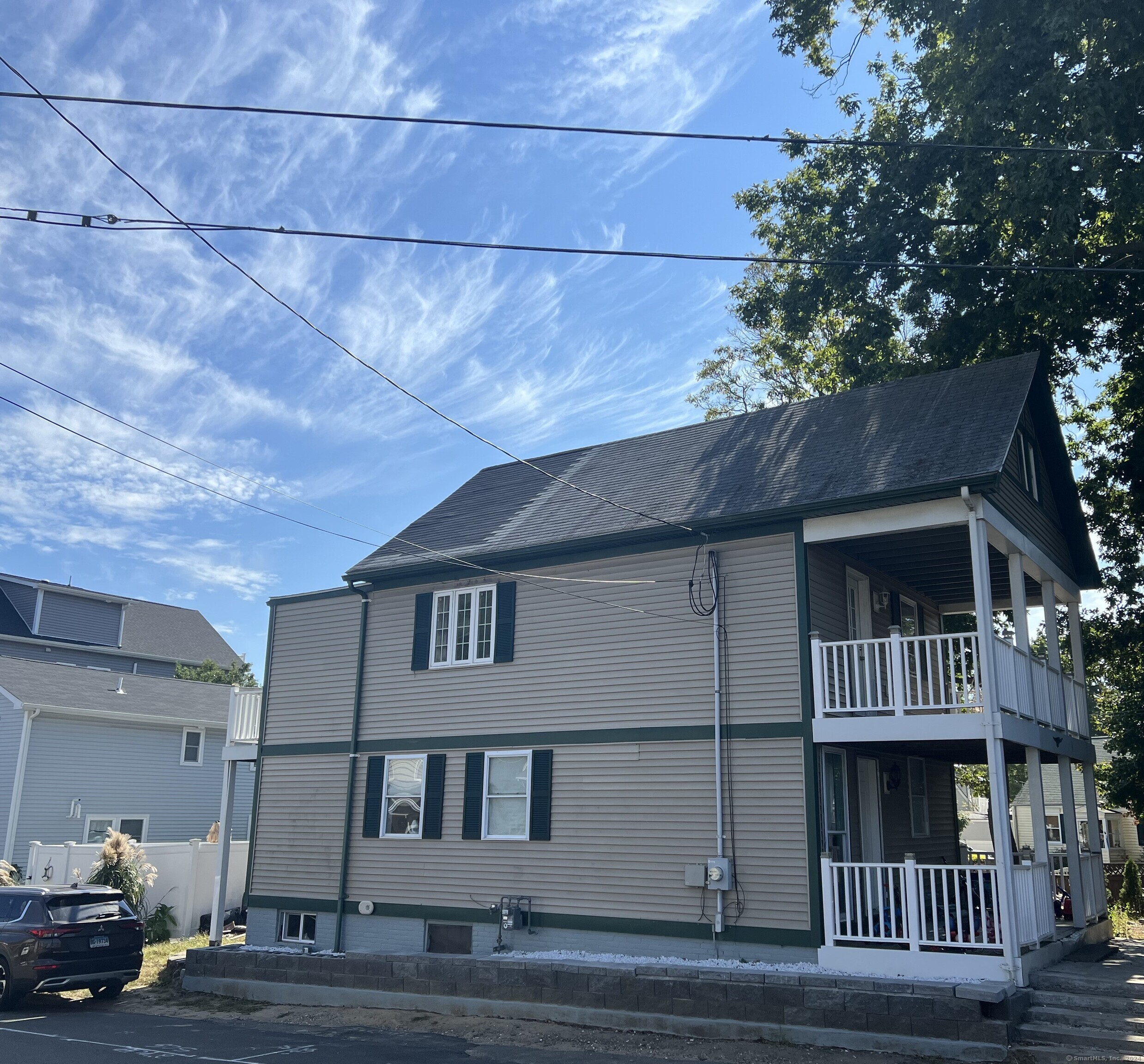 a view of front of house with a street