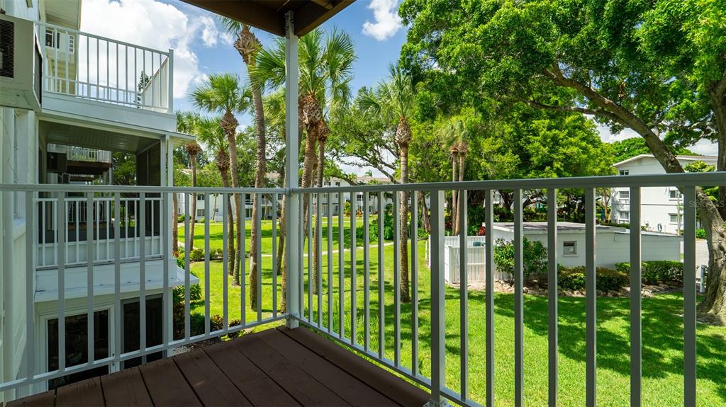 a view of a balcony with a lake view