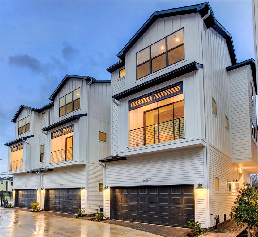 a front view of a house with a garage