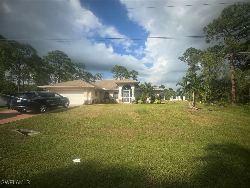 a front view of house with yard