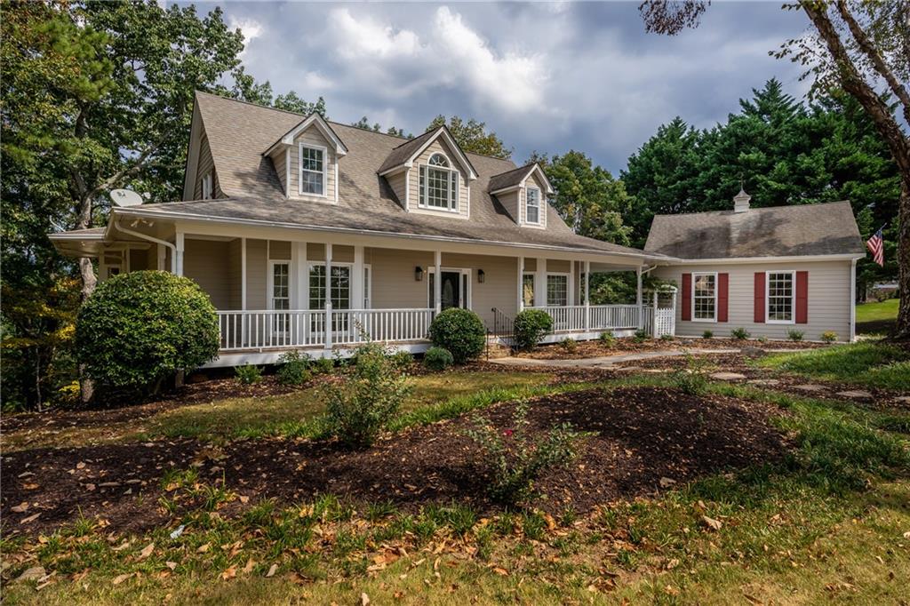 a view of a big yard in front of a house