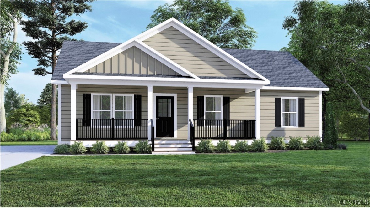 View of front facade with a porch and a front yard