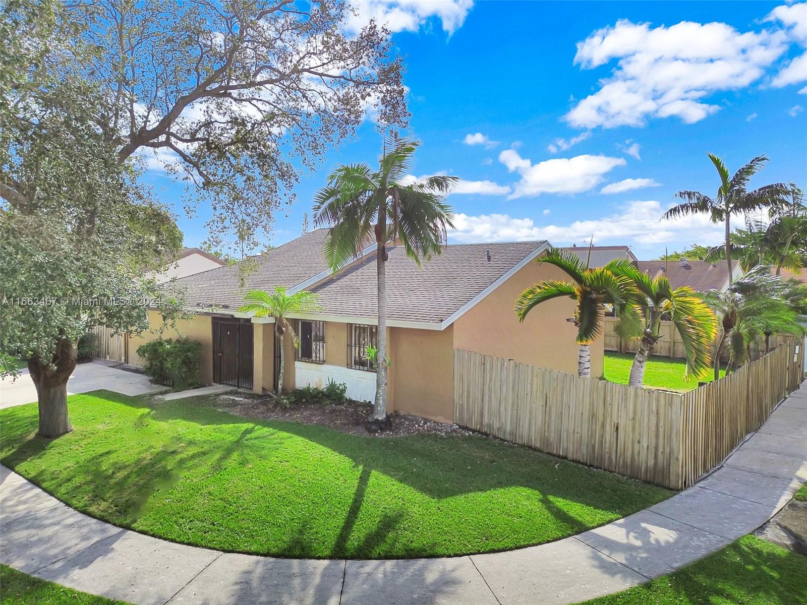 Spacious front yard in this truly corner lot