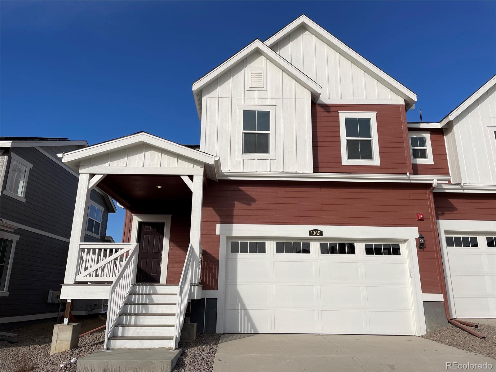 a view of a house with a garage