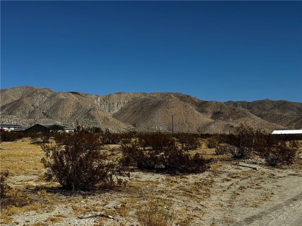 a view of a house with a mountain