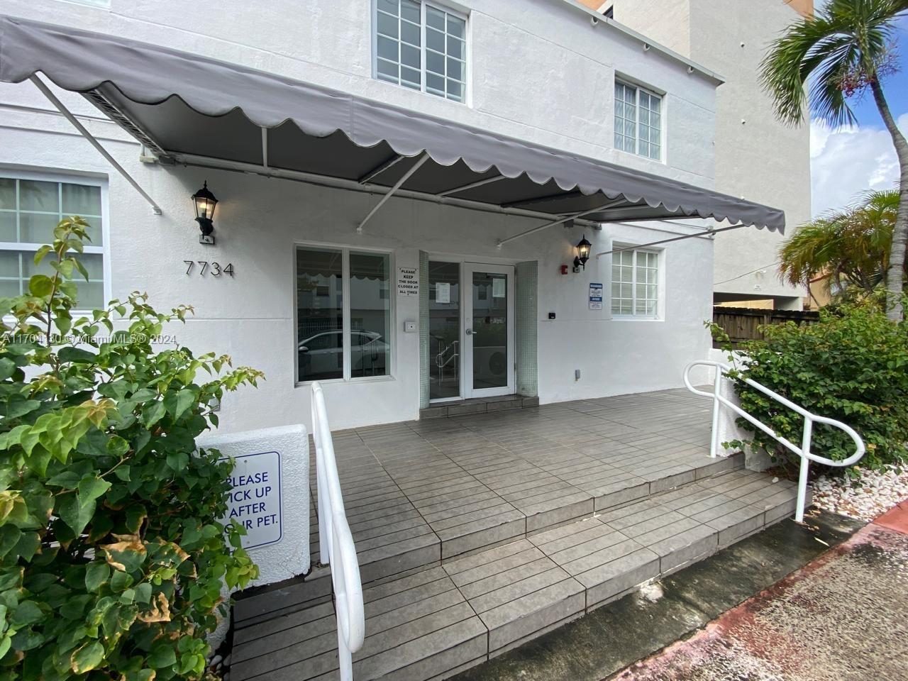 front view of a house with a patio