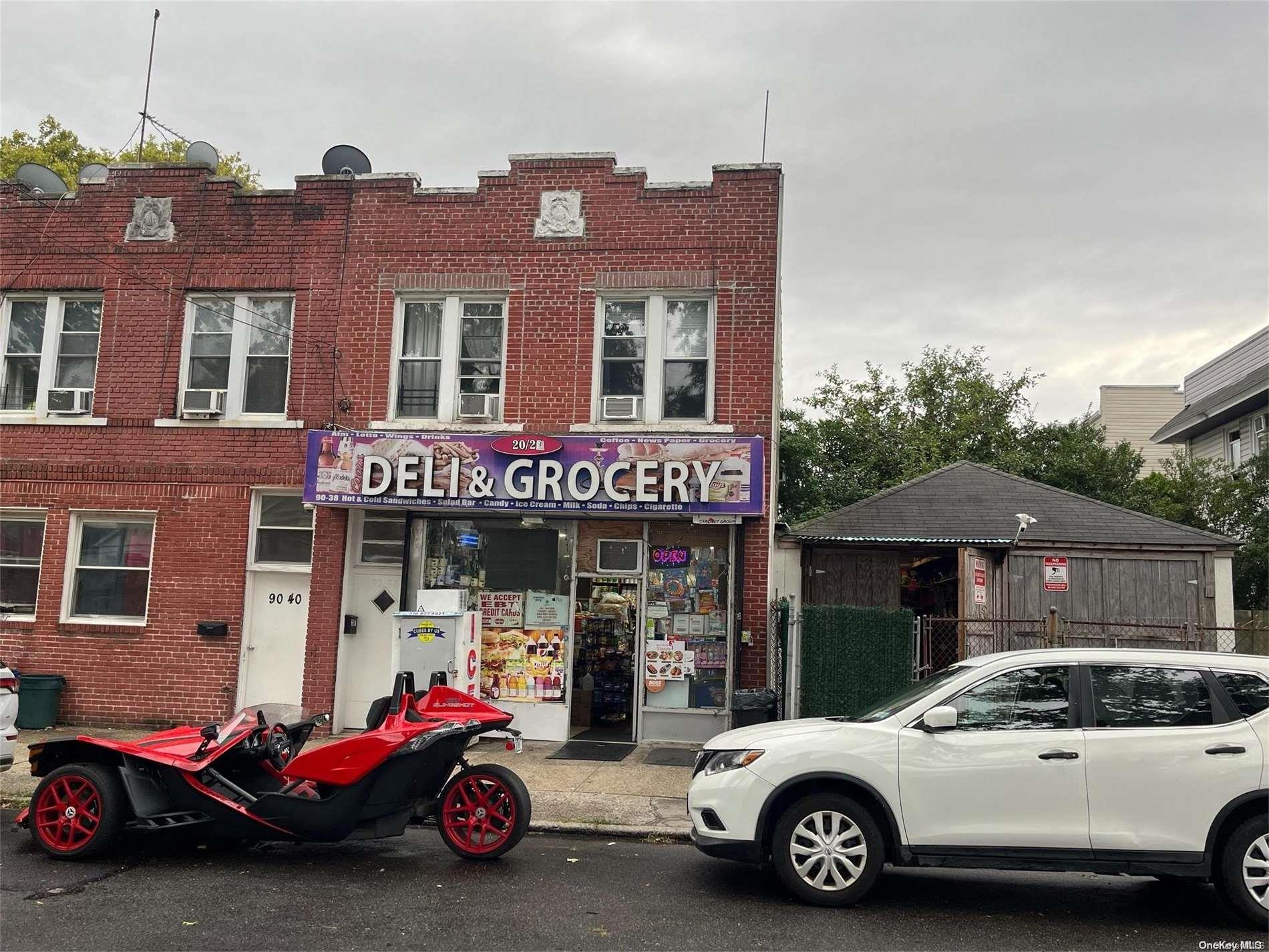 a car parked in front of a house