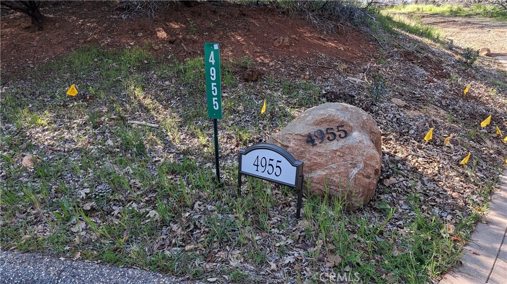 a sign that is on a rock