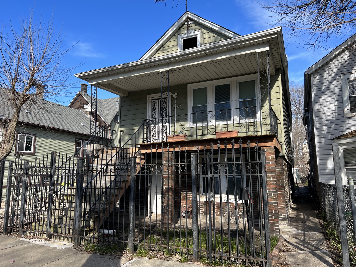 a front view of a house with a porch