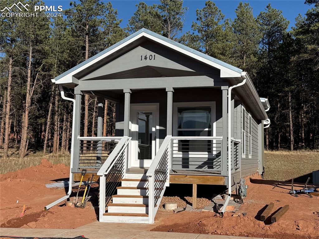 a front view of a house with porch