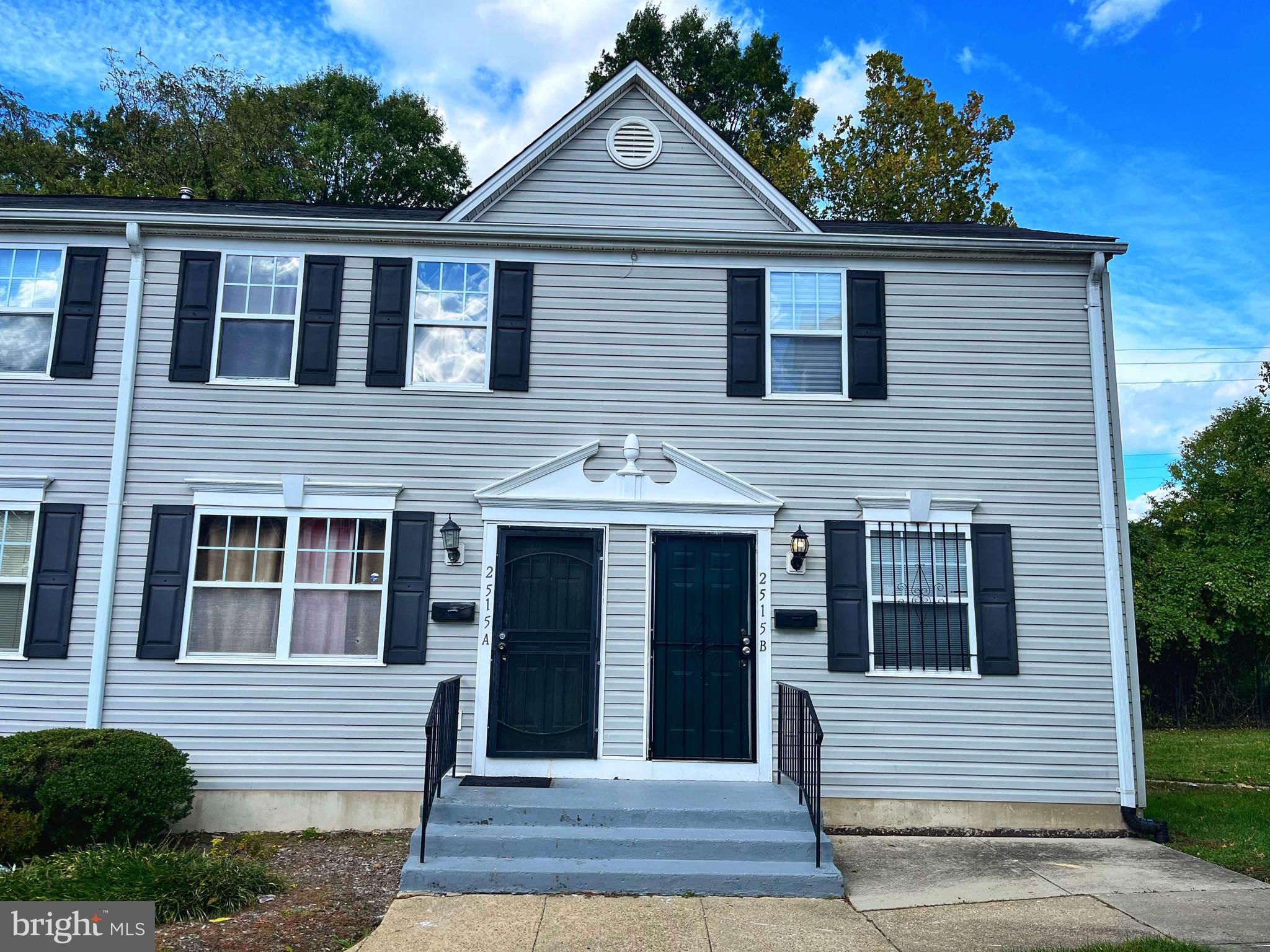 a front view of a house with a porch