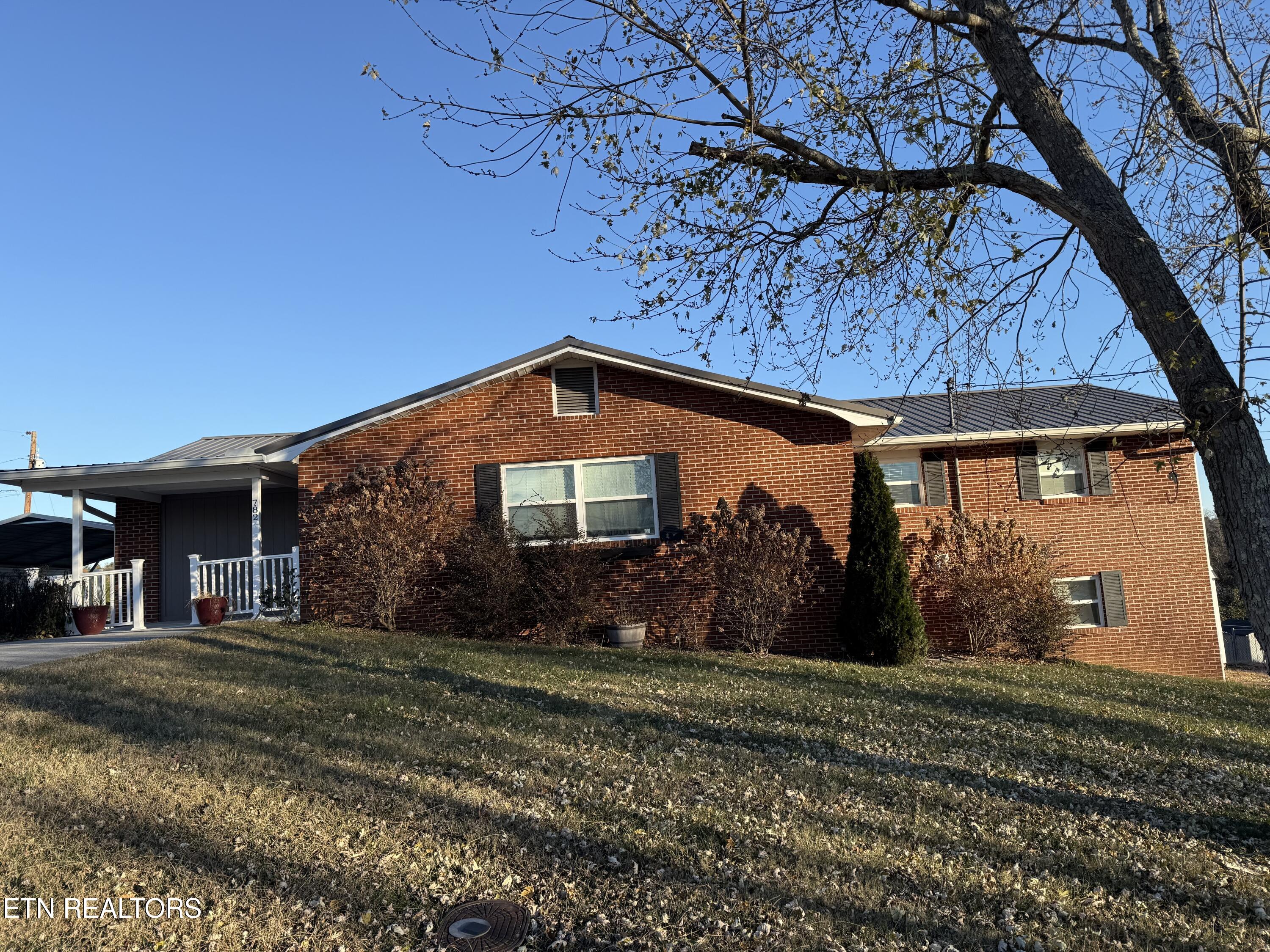 Brick Basement Ranch w Metal Roof