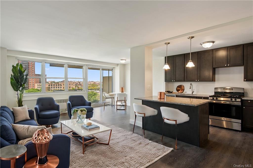 Living room with sink and dark hardwood / wood-style flooring