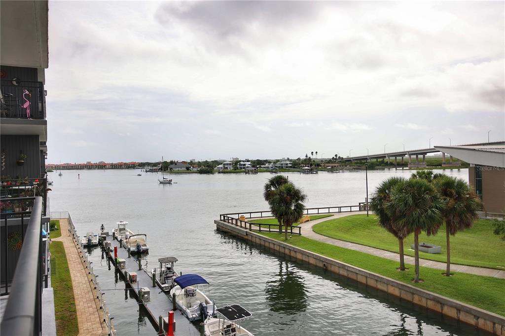 a view of a lake with outdoor seating