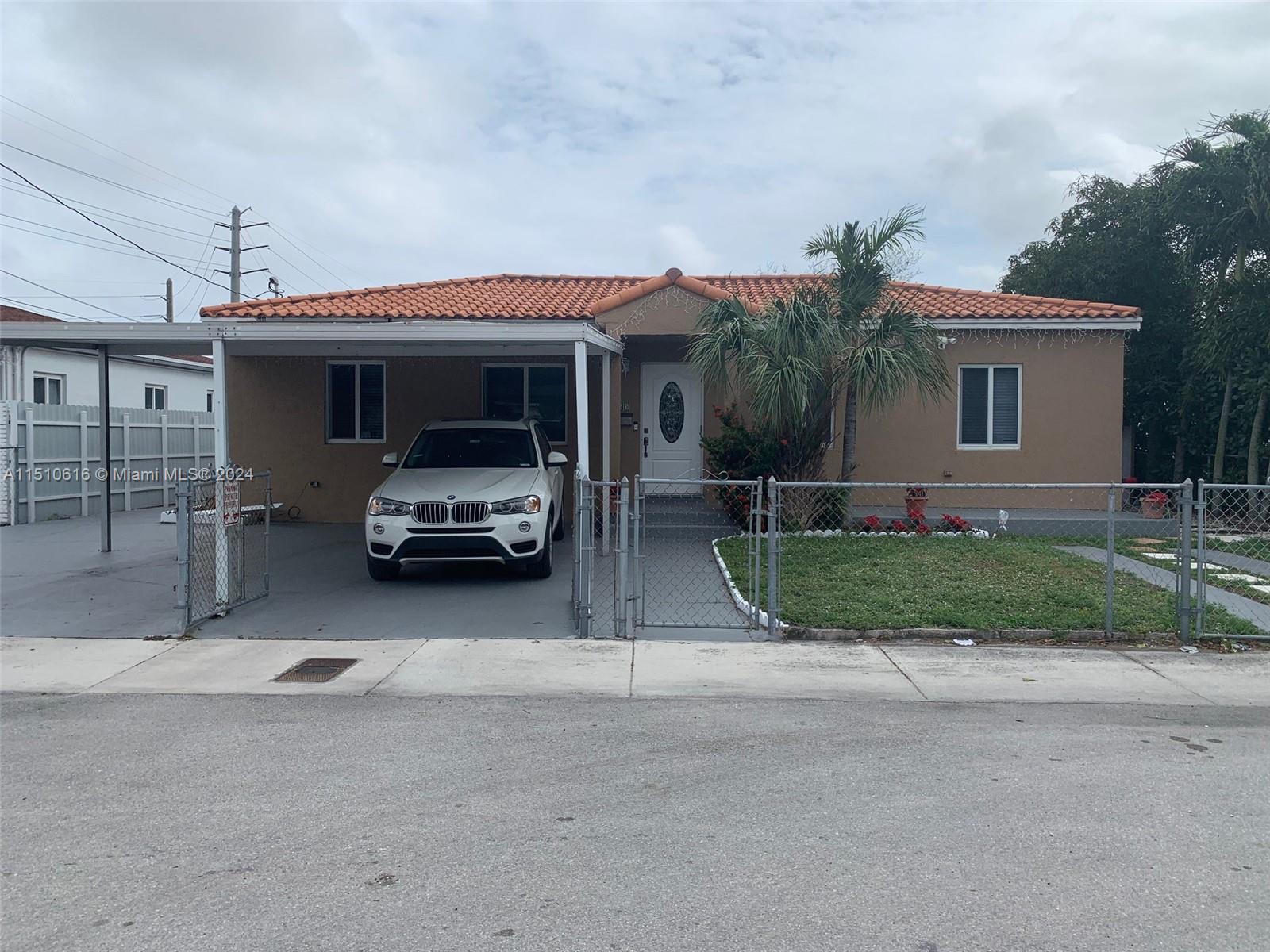 a car parked in front of house