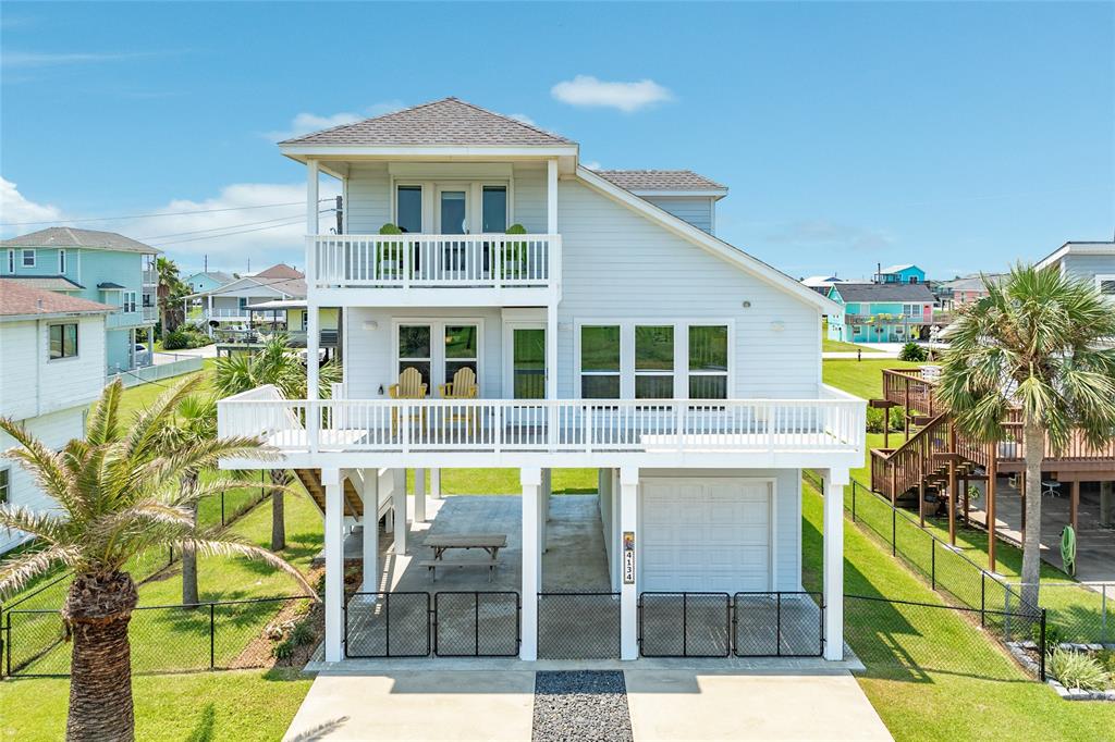 a front view of a house with a swimming pool