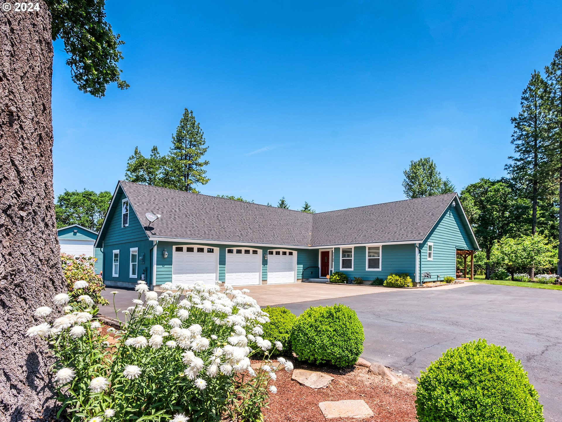 front view of a house with a yard