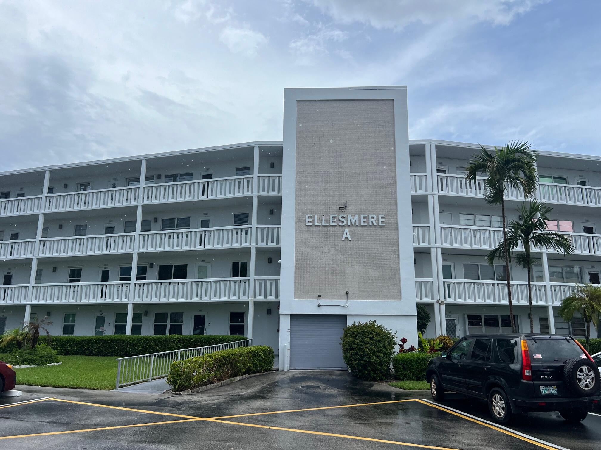 a cars parked in front of a building