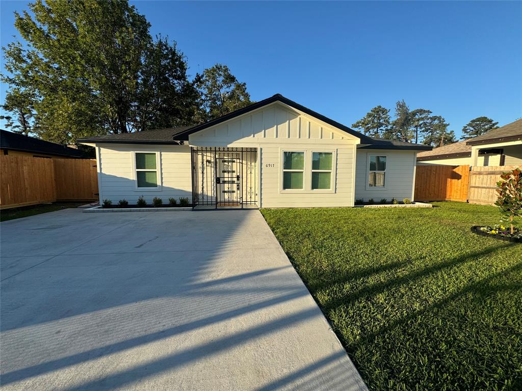 a front view of a house with yard