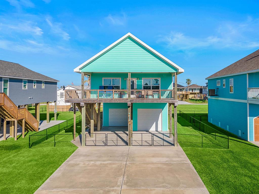 a front view of a house with a yard table and chairs