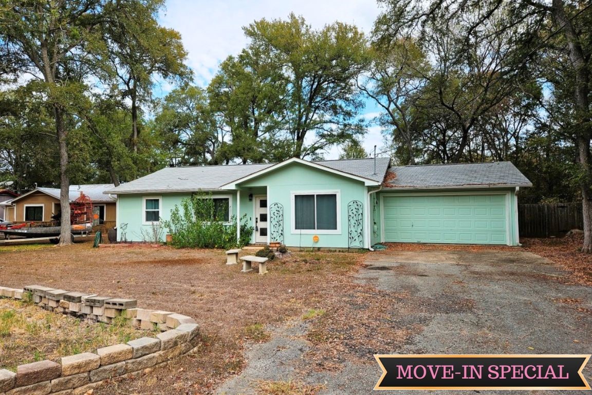 a house with trees in the background