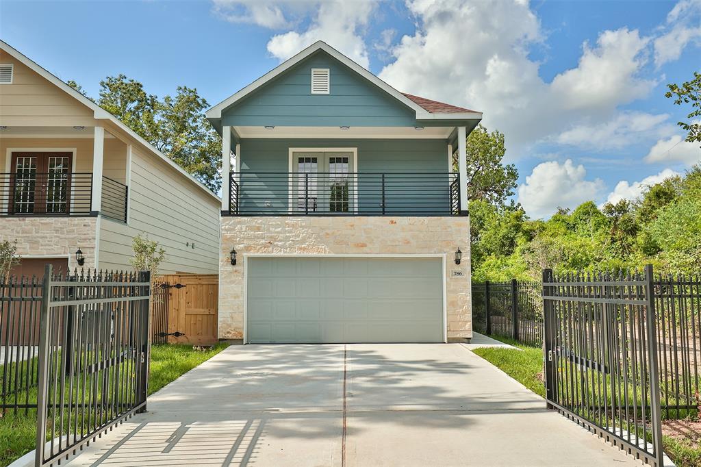 a front view of a house with a garage