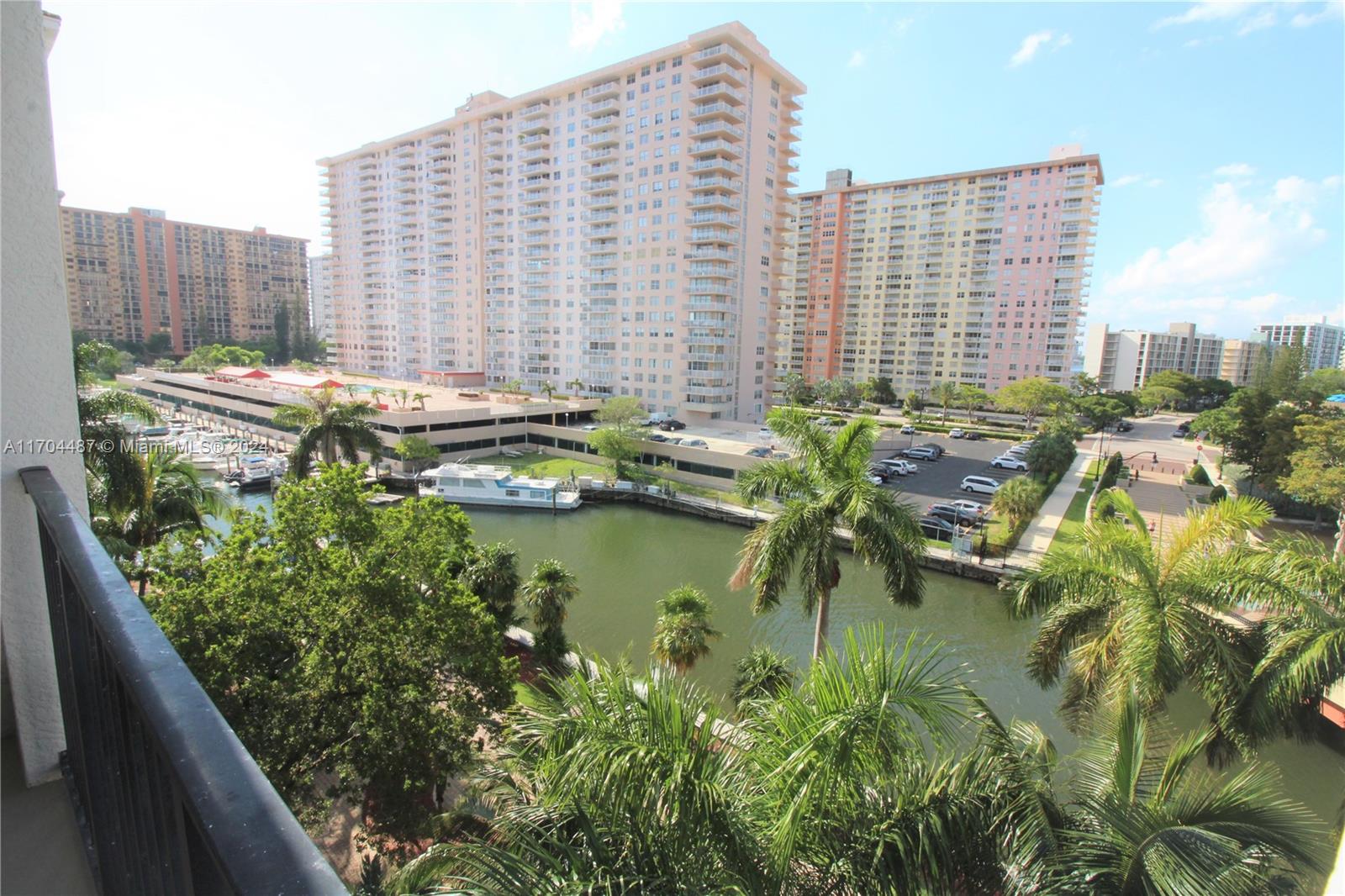 a view of a city with tall buildings