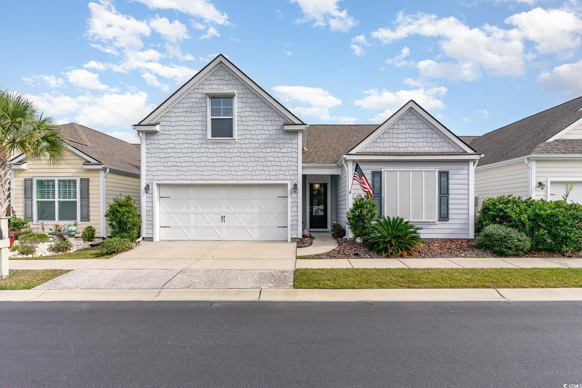 View of front of house with a garage