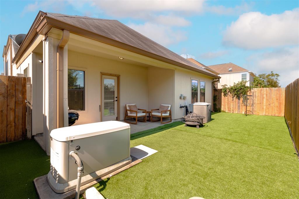 a view of a house with swimming pool and porch