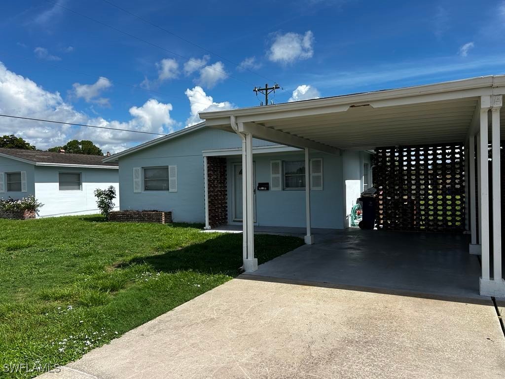 a view of a house with a back yard