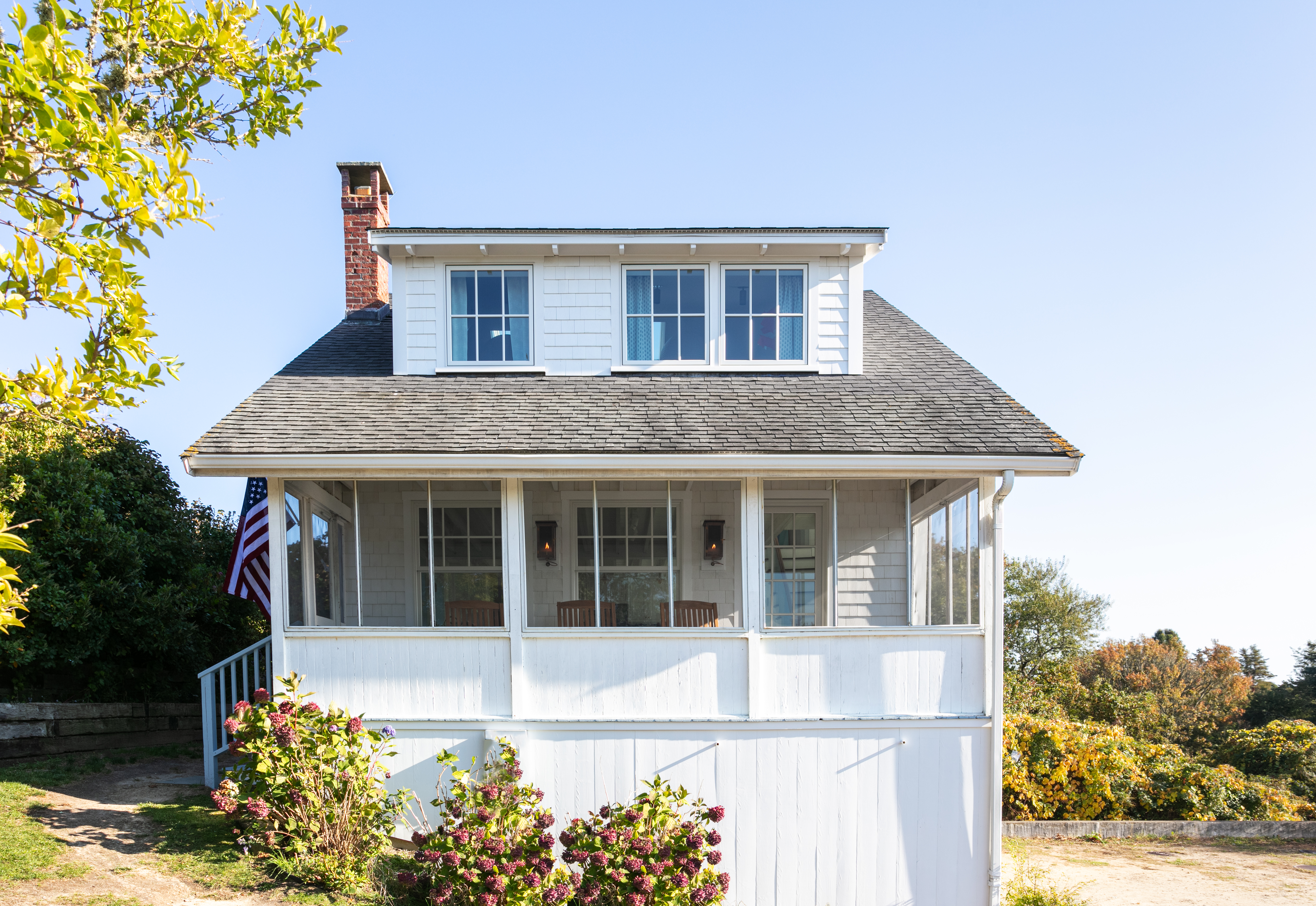 a house view with a garden space