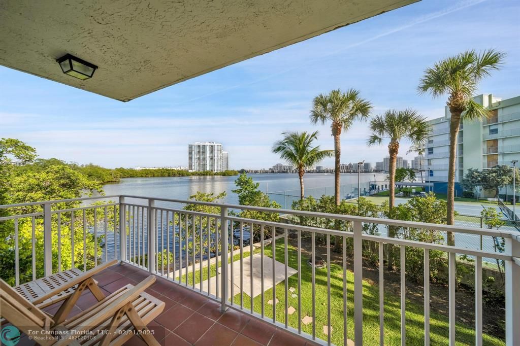 a view of a balcony with lake view