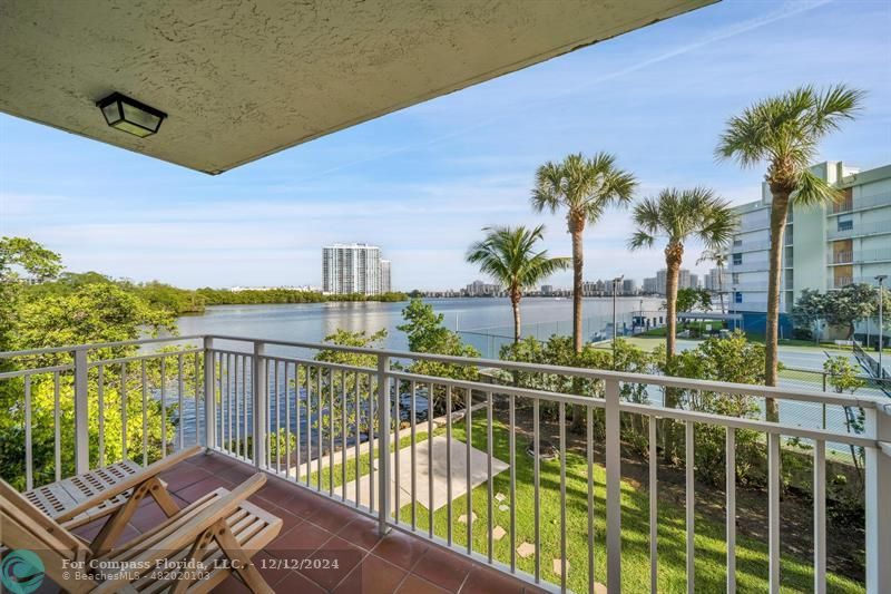 a view of a balcony with lake view