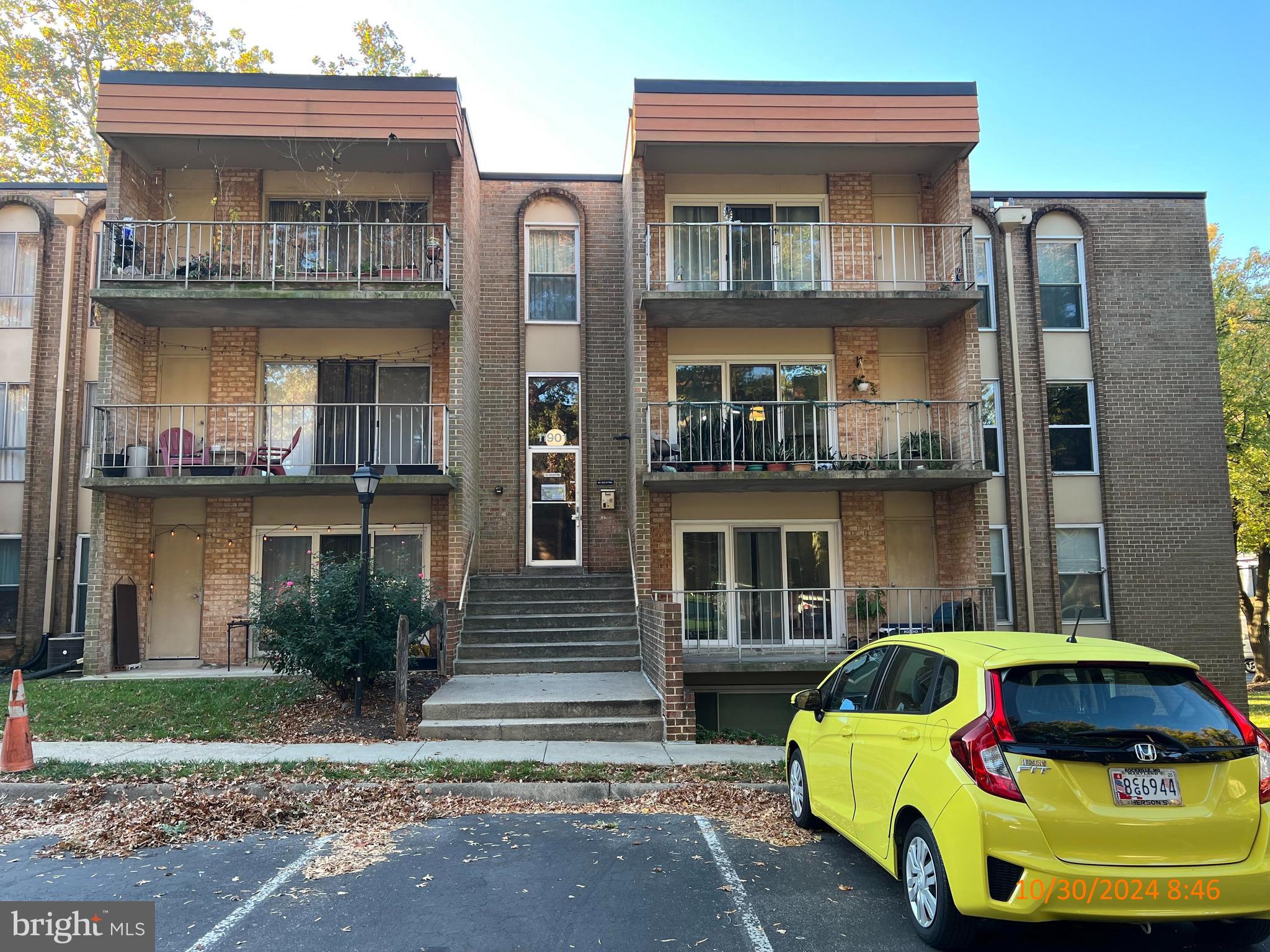 a yellow house with outdoor space