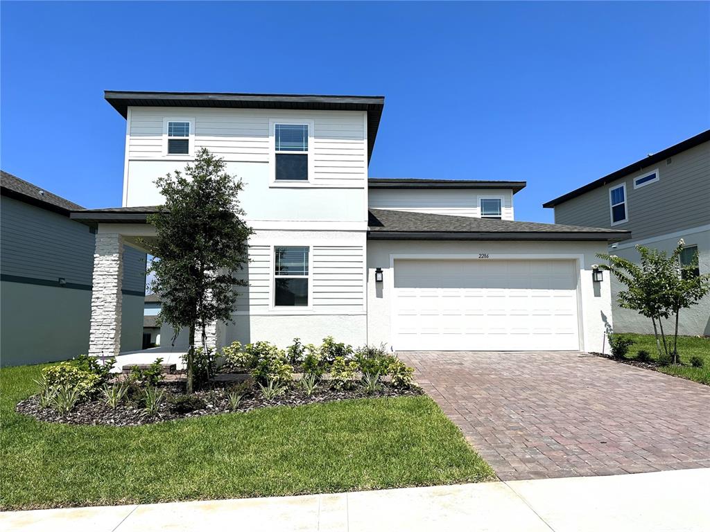 a front view of house with yard