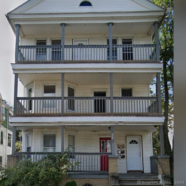 front view of a house with a lots of windows