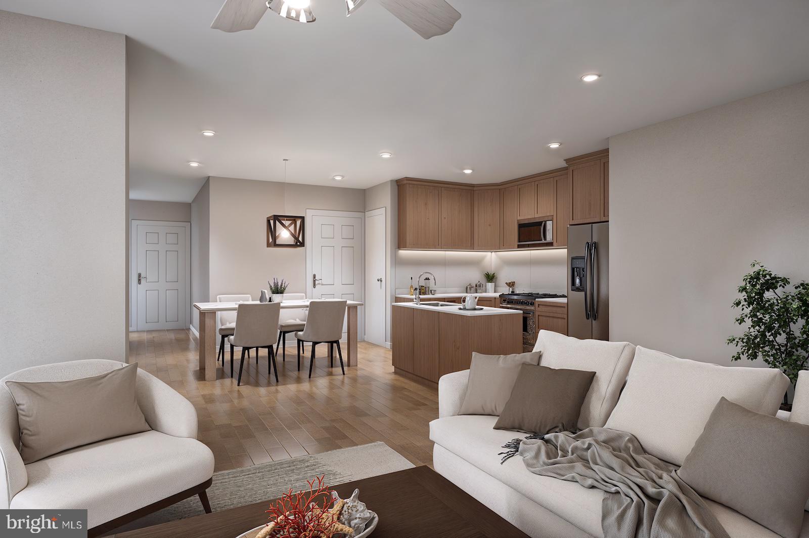 a living room with furniture kitchen view and a dining table