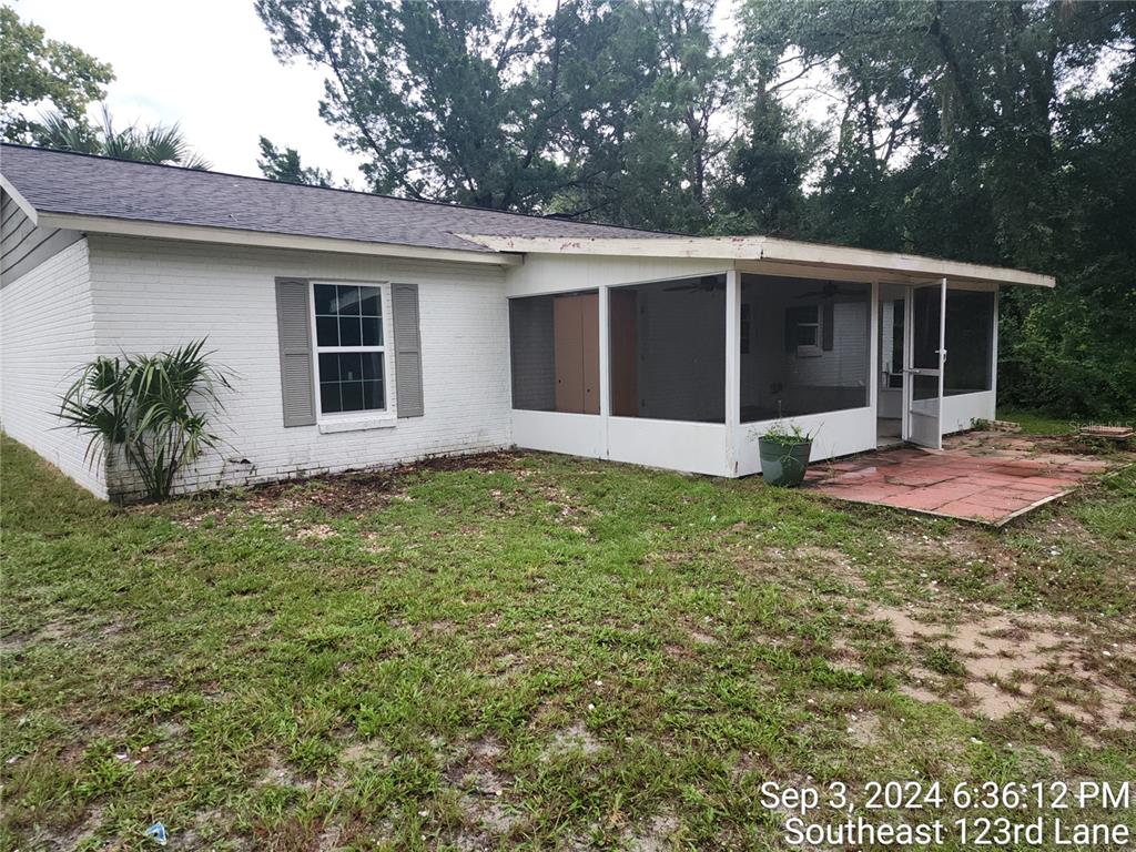 a house with yard in front of it