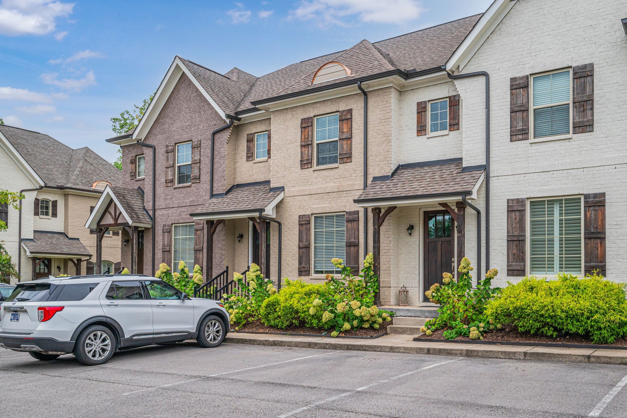 a car parked in front of a house