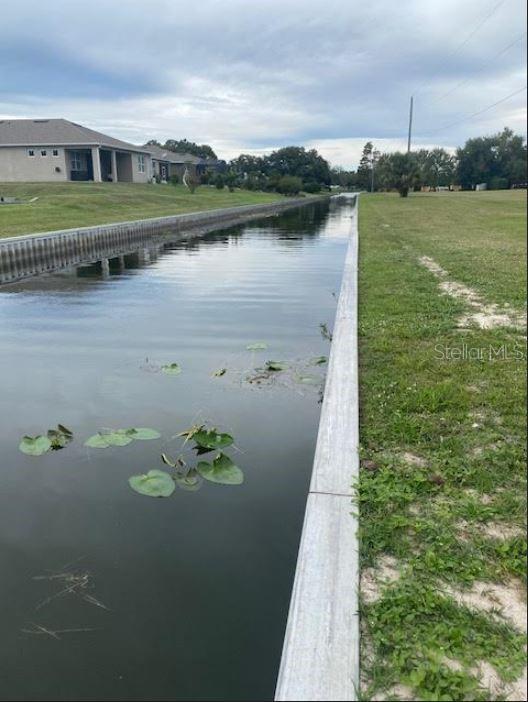 a view of a lake with houses