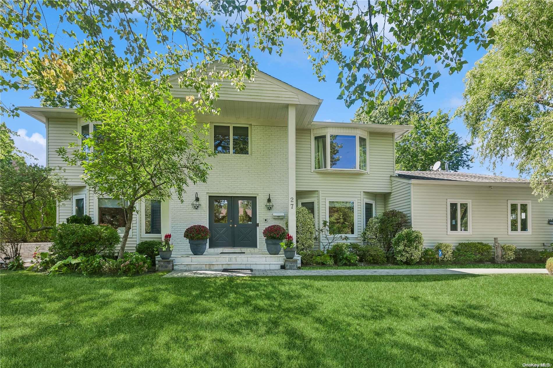 a house view with a garden space