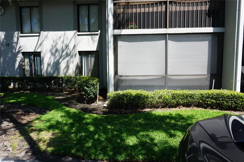 a view of backyard with seating space