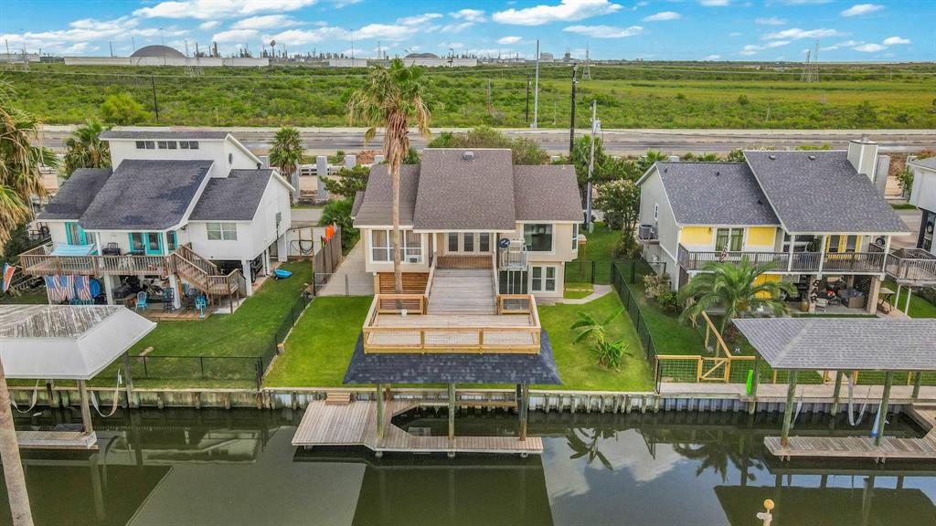 an aerial view of a house with a ocean view